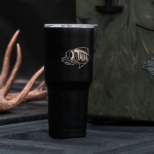 black taiga tumbler with woodland camo cooler and deer antlers
