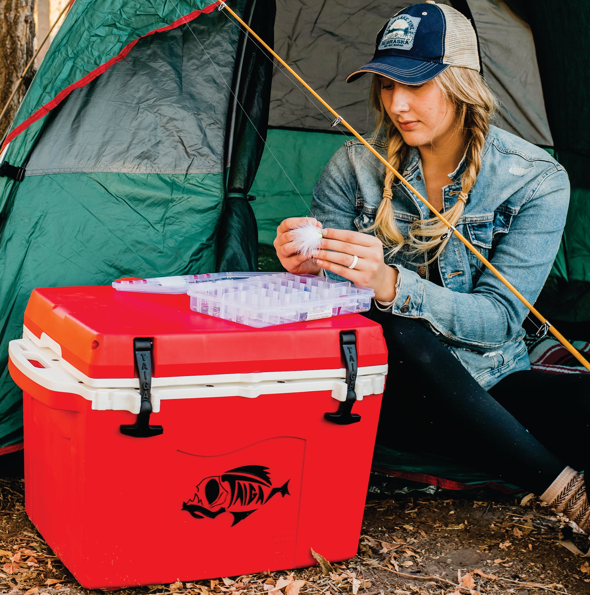 Woman with Taiga Red cooler camping in a tent
